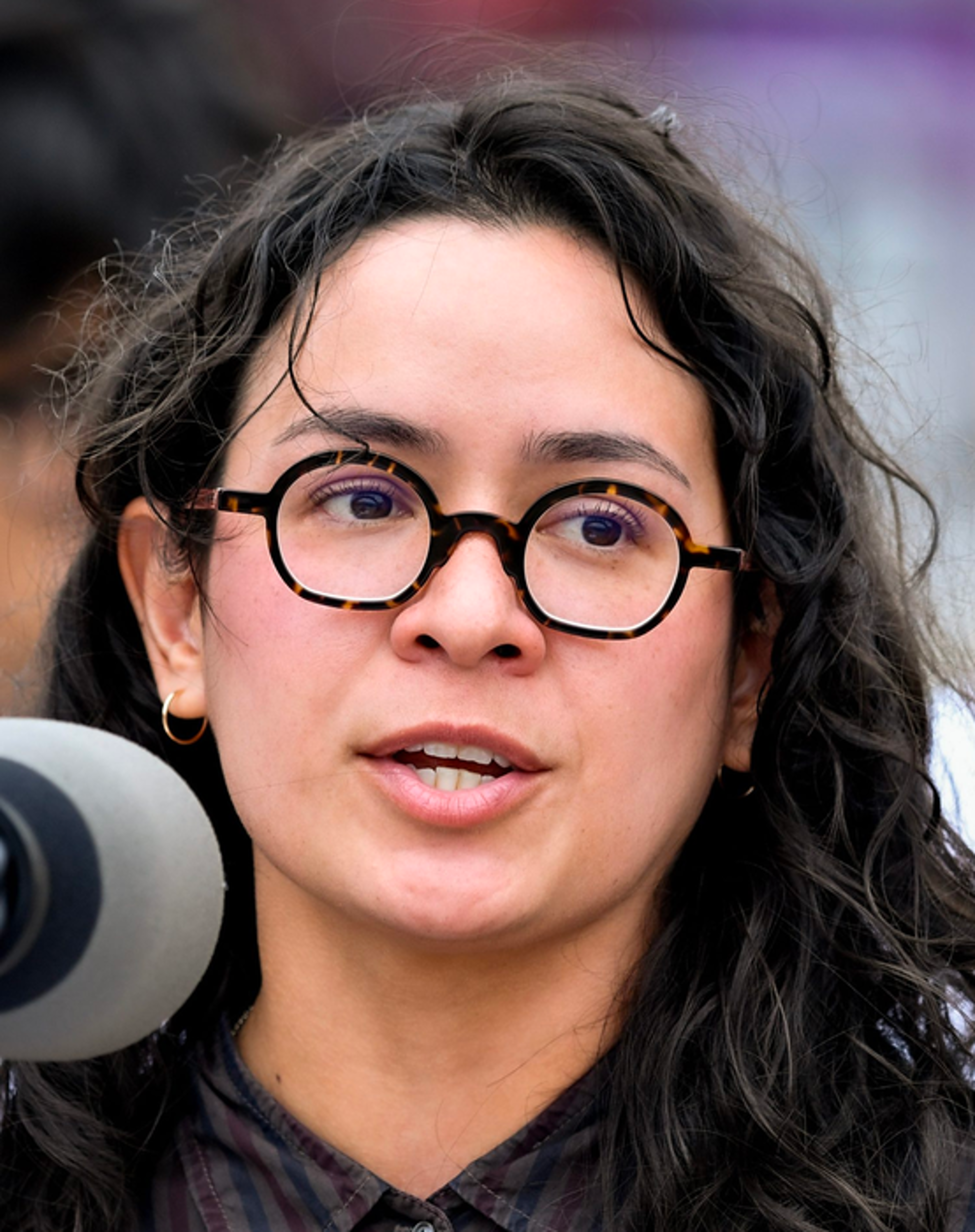 Claire Valdez speaks at a rally in New York City.