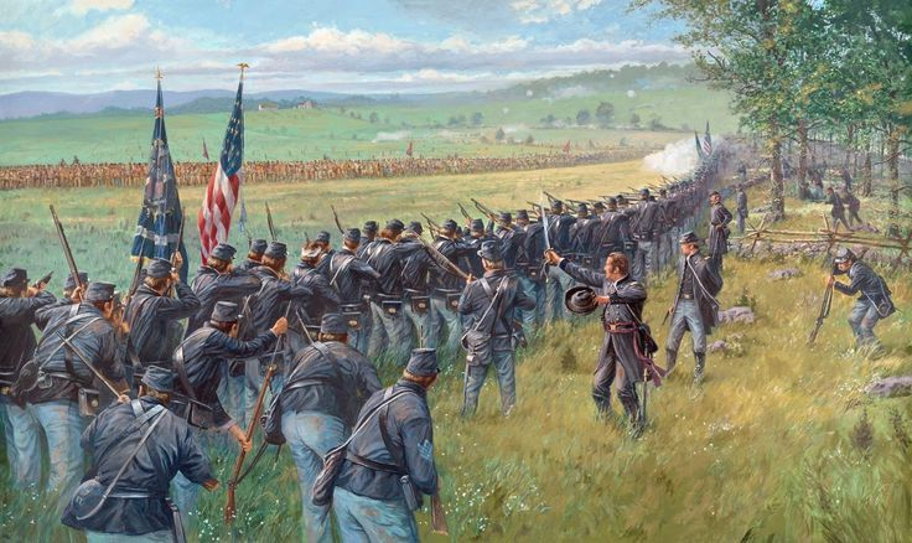 Union soldiers in a firing line facing the enemy.